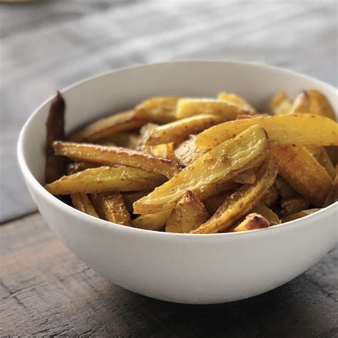 oven-baked-potato-wedges-spicy-fabs-good-food image