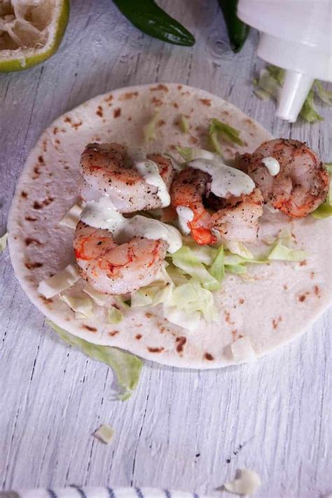grilled-shrimp-tacos-with-creamy-cilantro-chili-sauce image