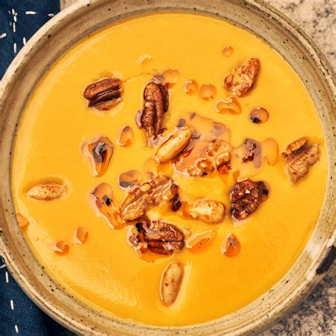 pumpkin-soup-with-spiced-nuts-recipe-bon-apptit image