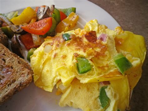 baked-cheddar-ham-omelet-recipe-recipezazzcom image
