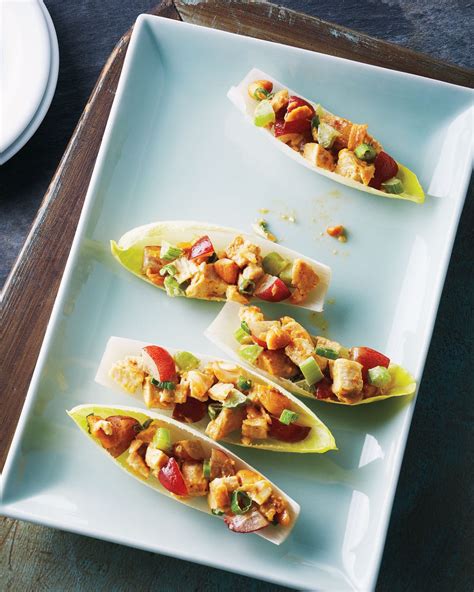 belgian-endive-spears-with-curried-chicken-salad image
