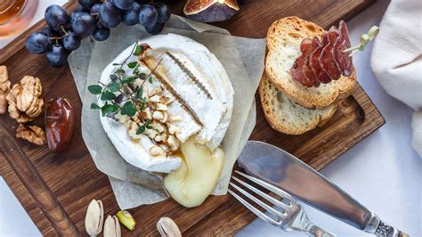 martha-stewarts-baked-brie-with-boozy-fruit-compote image