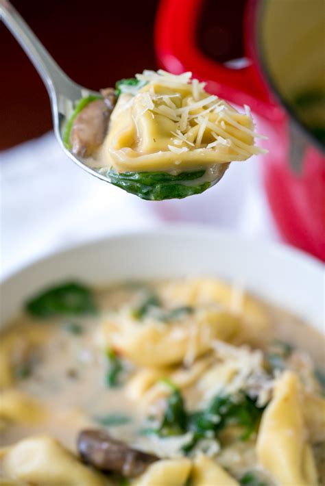 creamy-parmesan-spinach-mushroom-and-tortellini-soup image