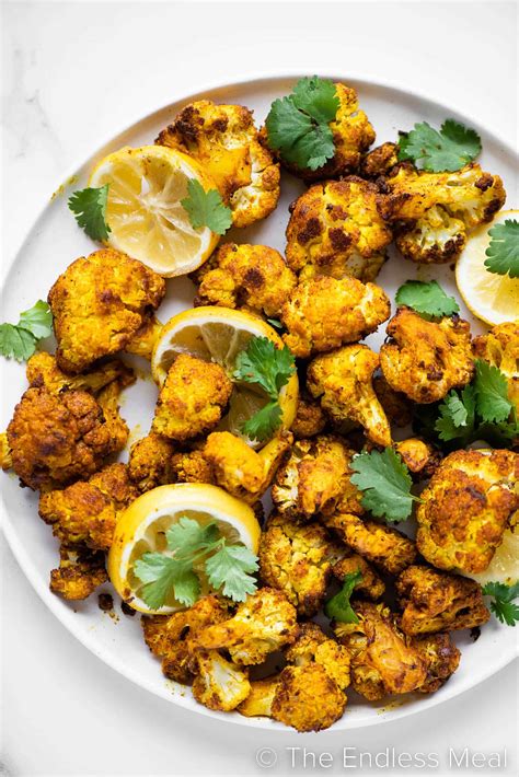 golden-roasted-turmeric-cauliflower-the-endless-meal image