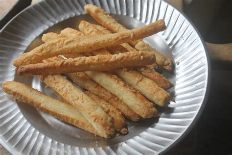 cheese-straws-recipe-cheddar-cheese-sticks image