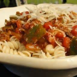 brats-in-red-sauce-over-pasta-bigoven image