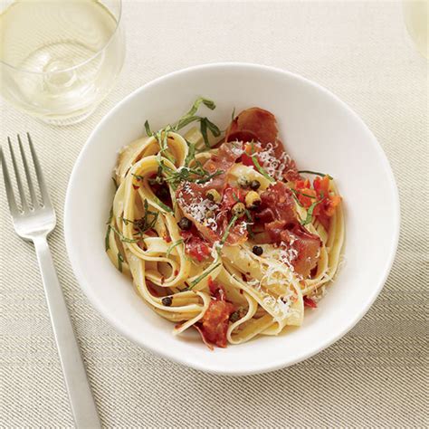 fettuccine-with-tomatoes-and-crispy-capers-food-wine image
