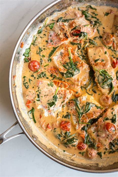 pan-seared-salmon-with-creamy-spinach-and-tomatoes image