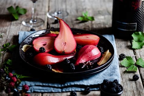 gin-cassis-bay-poached-pears-with-blackberries image