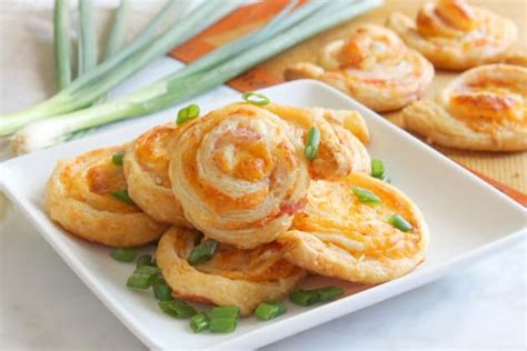 bacon-cheddar-pinwheels-recipe-food-fanatic image