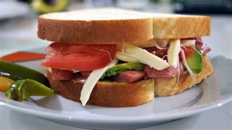 chicken-sandwich-recipe-with-avocado-lettuce image