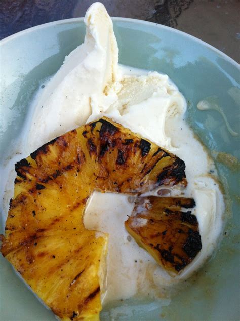grilled-pineapple-with-rum-sauce-vanilla-ice-cream image