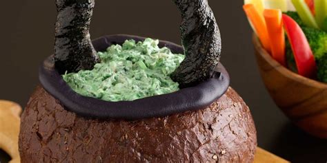 spooky-spinach-dip-in-bread-bowl-cauldron image