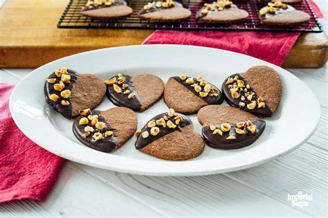 chocolate-dipped-hazelnut-shortbread-hearts-dixie image
