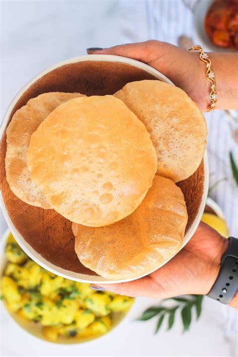puri-poori-how-to-make-perfect-fried-indian-bread image