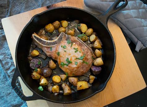 cast-iron-skillet-pork-chops-with-roasted-potatoes image