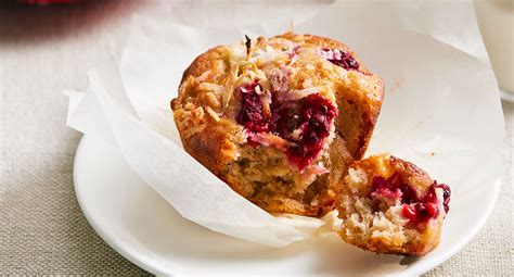banana-coconut-and-raspberry-breakfast-muffins image