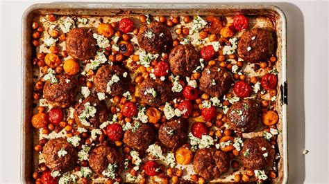 sheet-pan-chicken-meatballs-with-tomatoes-and-chickpeas image