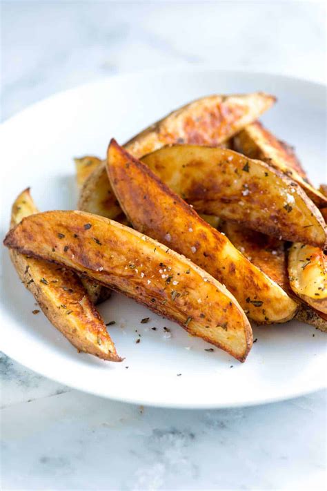 rosemary-baked-potato-wedges-inspired-taste image