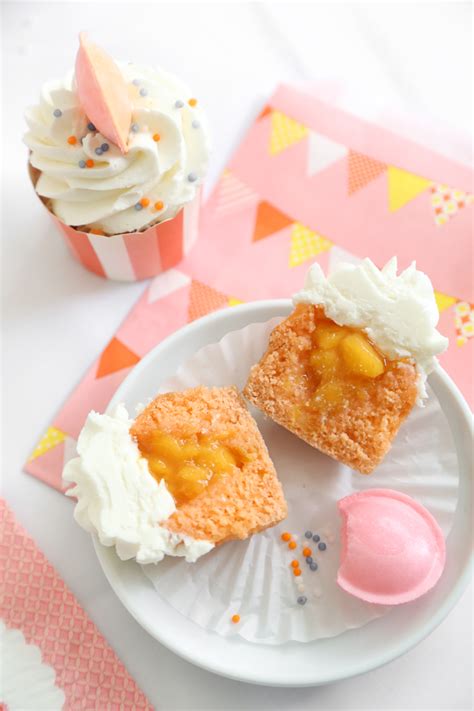 peachy-orange-marmalade-cupcakes-sprinkle-bakes image