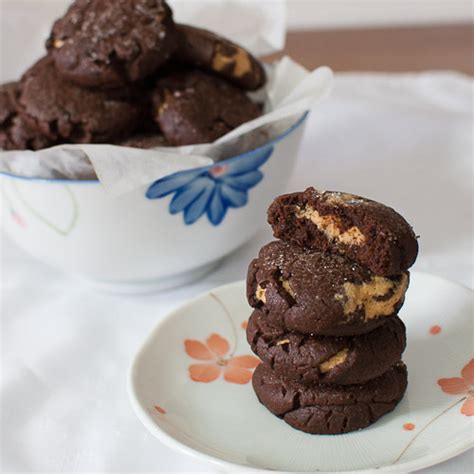 chocolate-peanut-butter-surprise-cookies-foodie-baker image