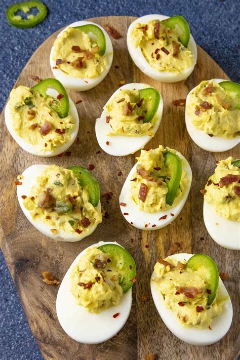 spicy-deviled-eggs-with-bacon-and-jalapeno-chili image