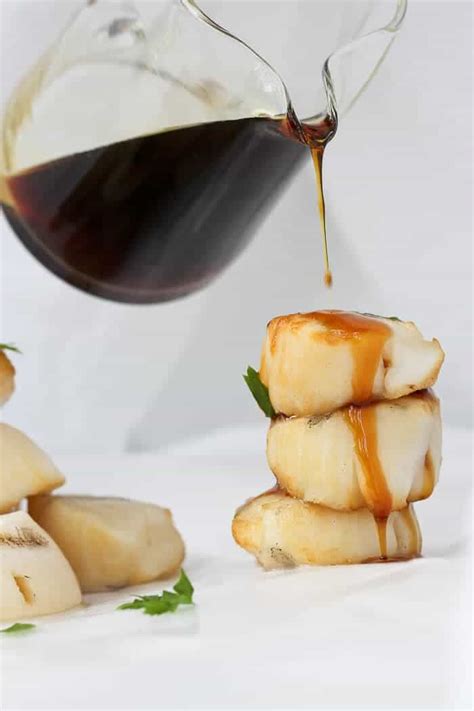 grilled-scallops-with-bourbon-sauce-champagne-tastes image