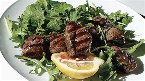 herb-marinated-grilled-lamb-with-arugula-salad image