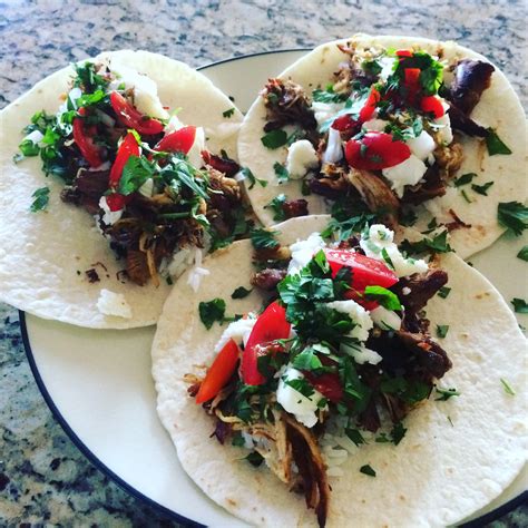 beer-and-citrus-braised-wild-game-carnitas-street-tacos image