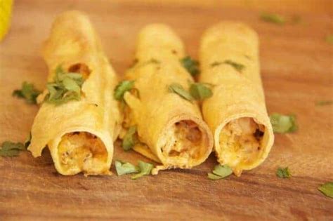 baked-chipotle-chicken-taquitos-half-baked-harvest image