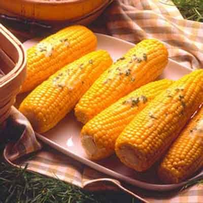 herb-buttered-corn-recipe-land-olakes image