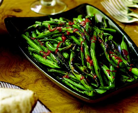 grilled-green-beans-with-harissa-recipe-food-republic image