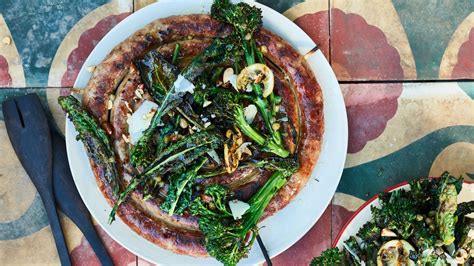 italian-sausage-with-grilled-broccolini-kale-and-lemon image