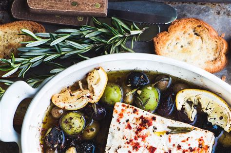 baked-feta-cheese-with-olives-and-lemon-the-view image