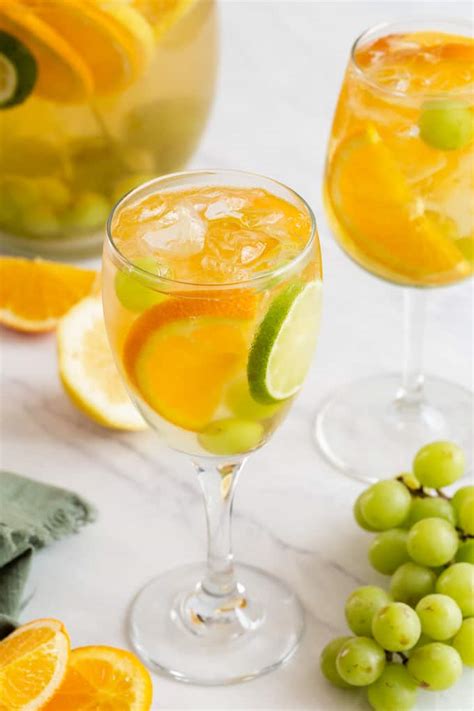 sparkling-white-sangria-family-food-on-the-table image