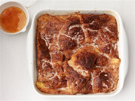 baked-croissant-french-toast-with-orange-syrup-food-network image