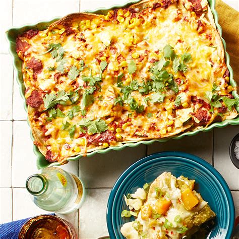 zucchini-corn-enchiladas-recipe-eatingwell image