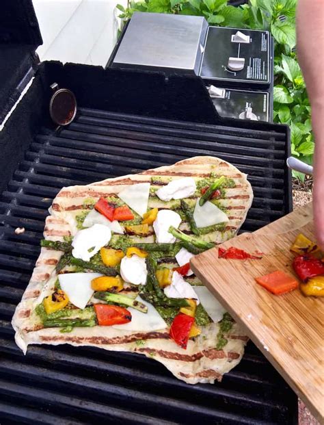 grilled-pesto-and-veggie-pizza-recipe-the-hungry image
