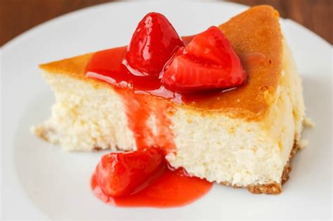 new-york-style-cheesecake-with-strawberry-topping image