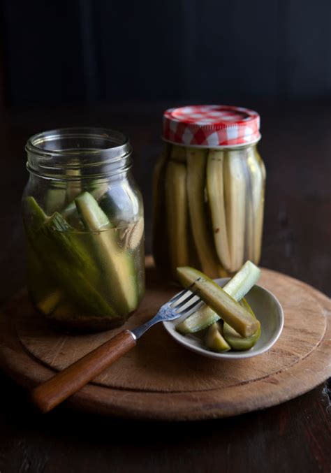 easy-sweet-and-sour-dill-pickled-cucumbers-drizzle image