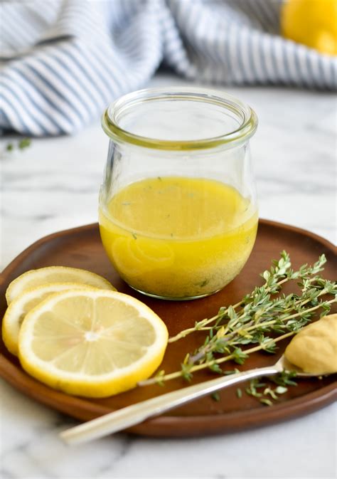 lemon-thyme-vinaigrette-with-two-spoons image