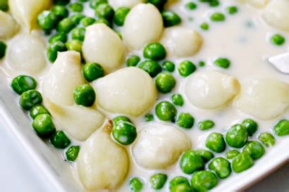 creamed-peas-with-pearl-onions-tasty-kitchen image