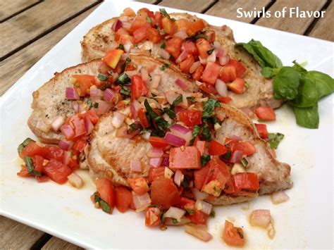 italian-pork-chops-with-tomato-basil-topping-swirls image