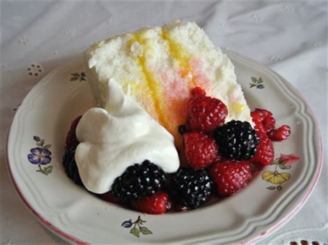 angel-food-cake-with-lemon-curd-and-fresh-berries image