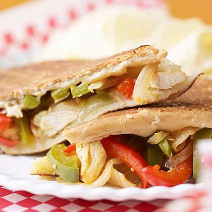 chicken-philly-sandwiches-recipe-myrecipes image