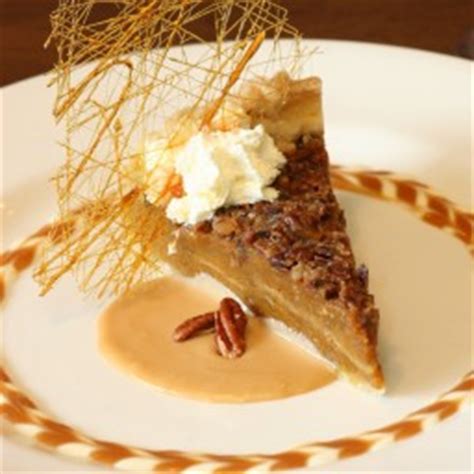 pumpkin-pecan-pie-with-whiskey-butter-sauce image