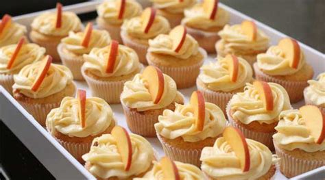 peach-cupcakes-with-peach-cream-cheese-frosting image