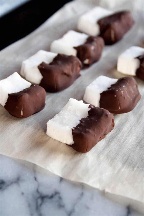 dark-chocolate-dipped-coconut-bites-hungry-by-nature image
