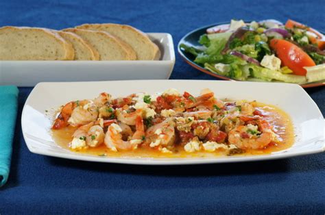 baked-prawns-in-tomato-sauce-with-feta-garithes image