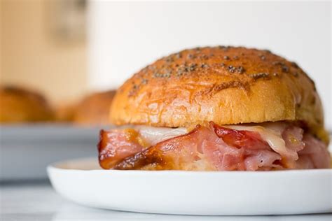baked-ham-and-cheese-party-sandwiches-with-apple image